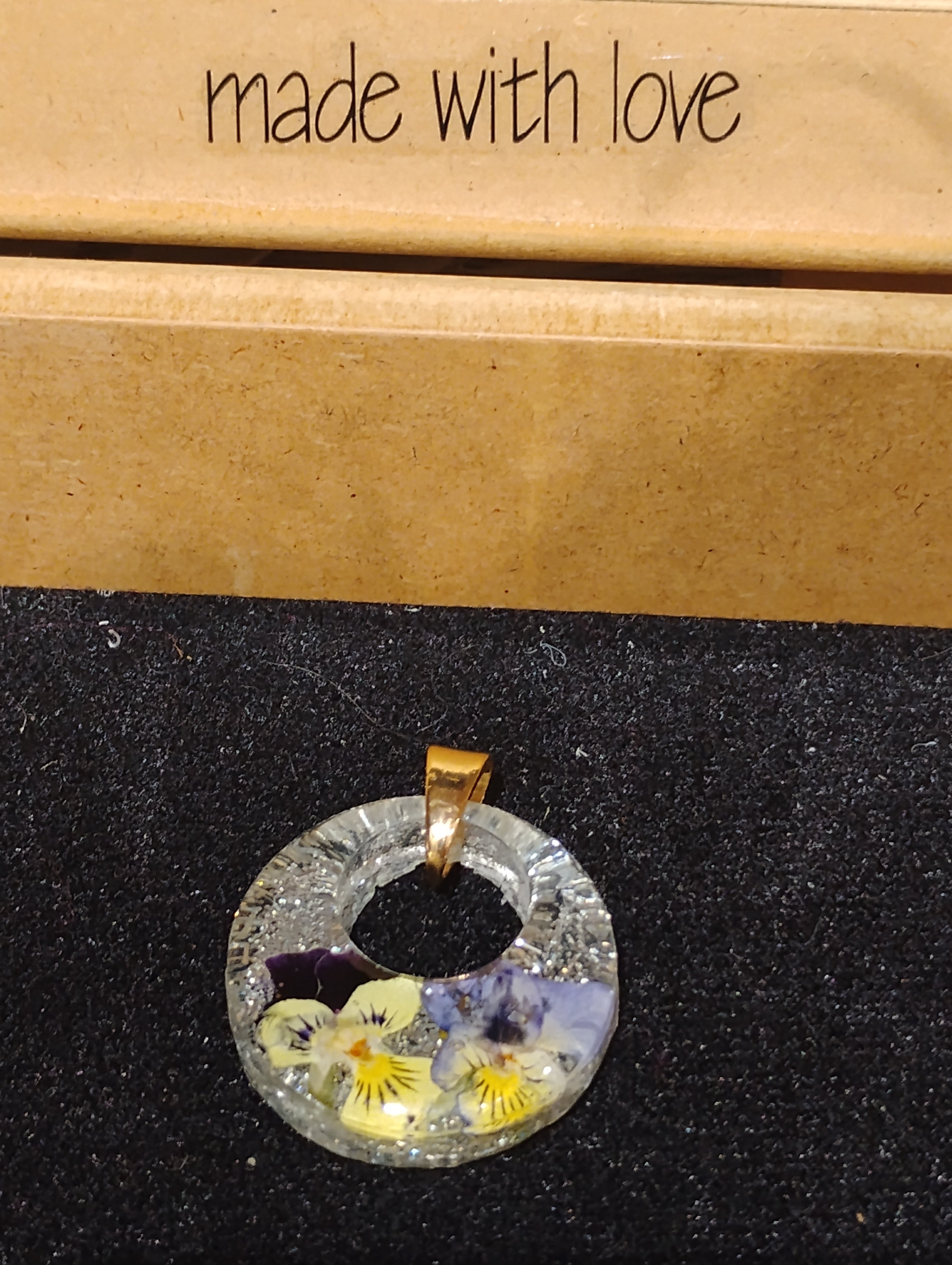Ring Shaped Flower/Fern Pendant