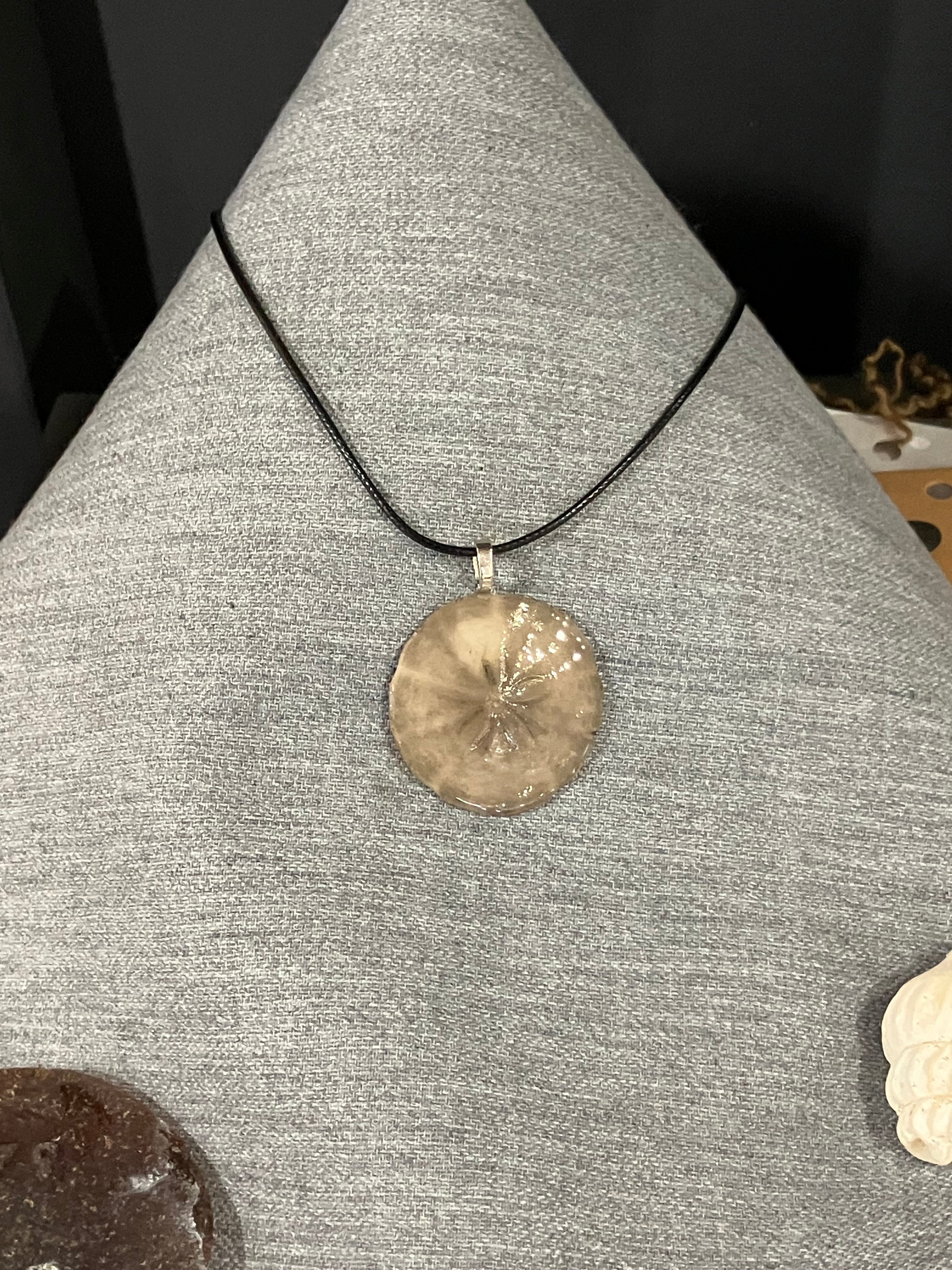 Sand dollar necklace black cord