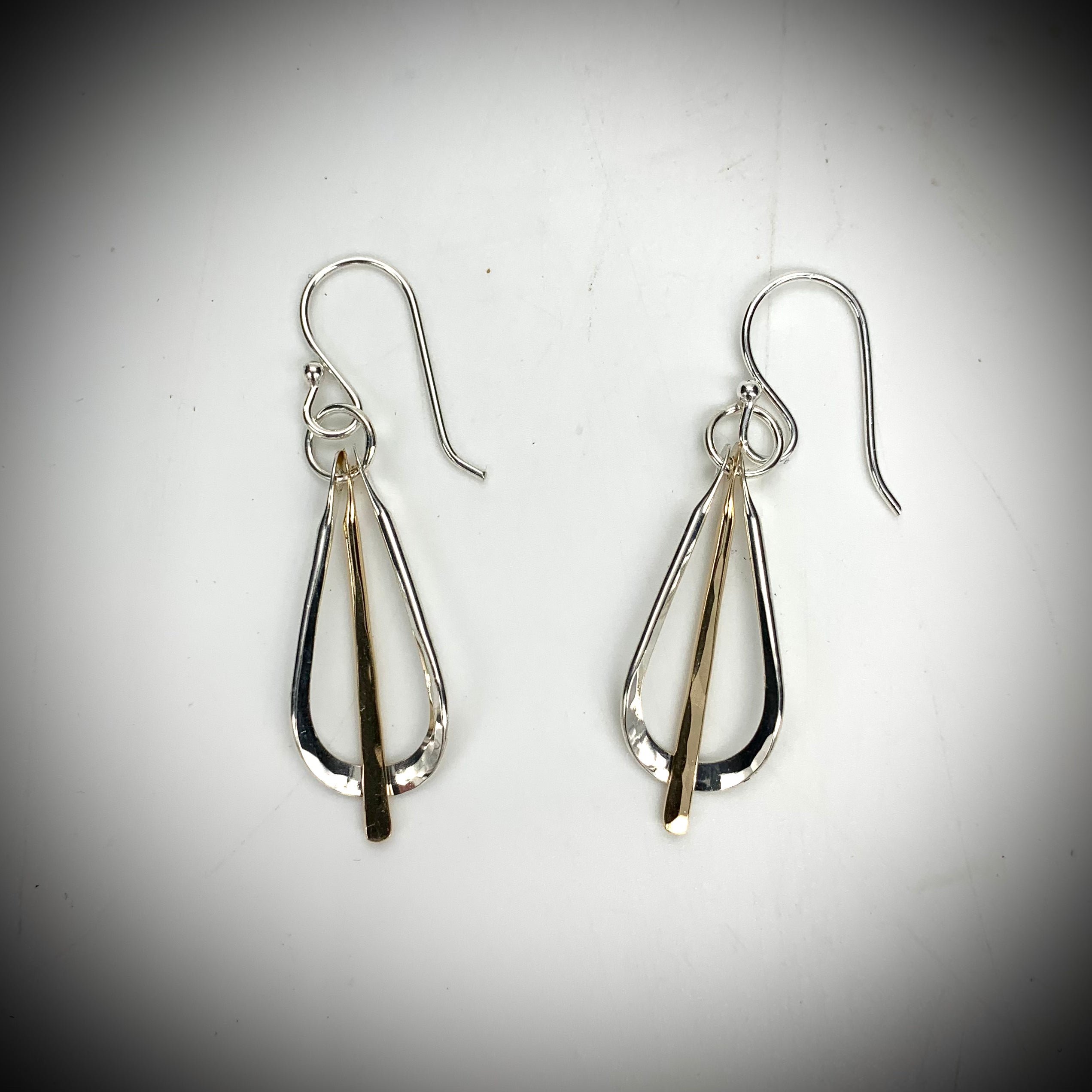 Dangling Metronome by Sausalito Precious Metals Inc.