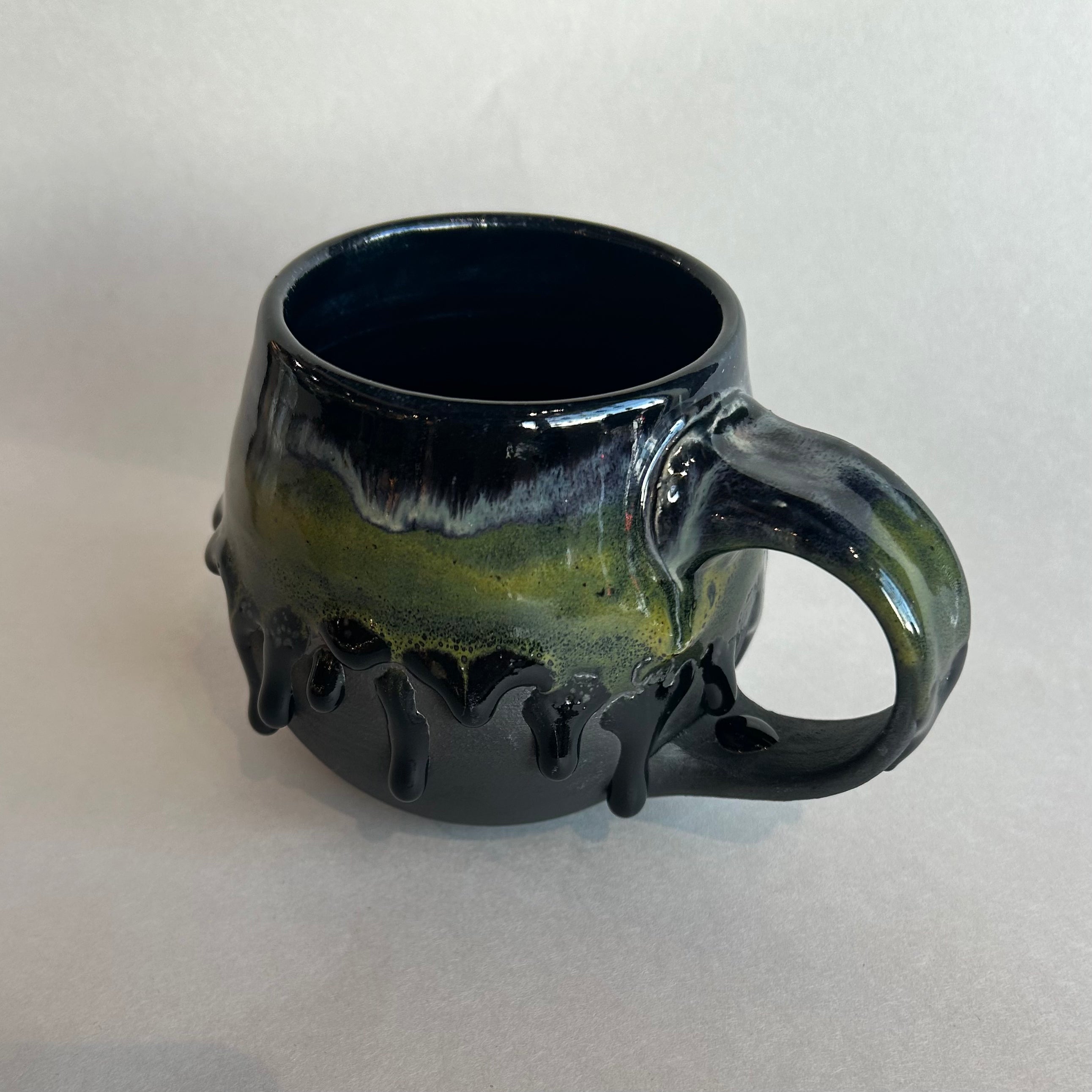 Green White Spooky Black Drip Mug