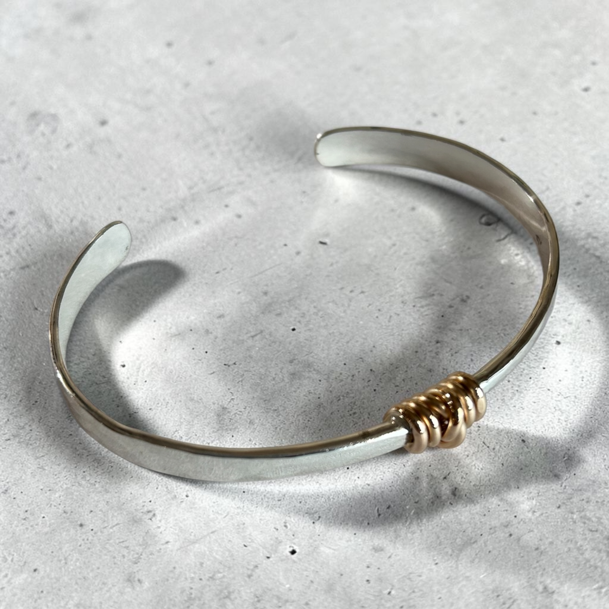 Silver Bracelet with Gold Knot