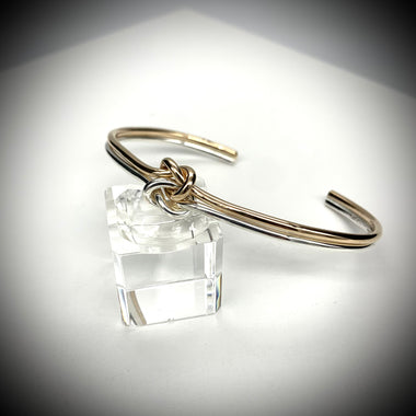 Double Knot Cuff by Sausalito Precious Metals Inc.